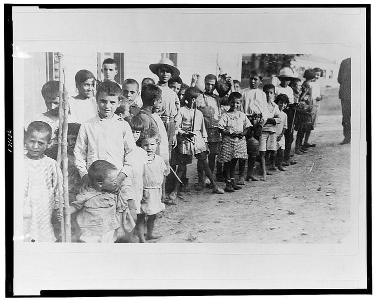 754px Greek and Armenian refugee children from Anatolia standing outside one story building near Athens Greece LCCN2002709161